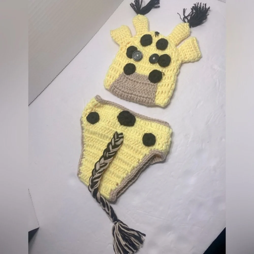 Crocheted baby giraffe outfit.